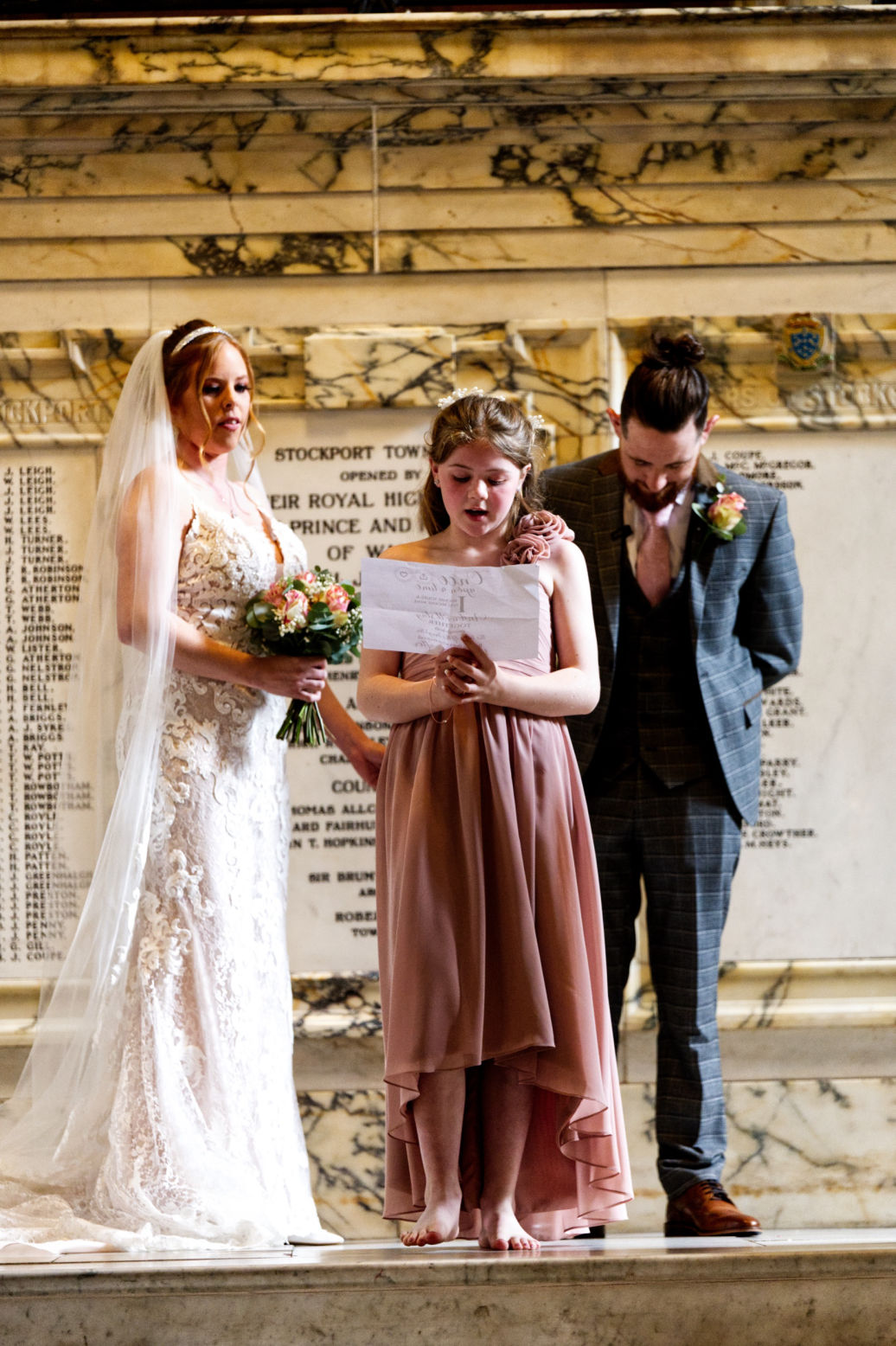 Emotional wedding photography during registry office vows